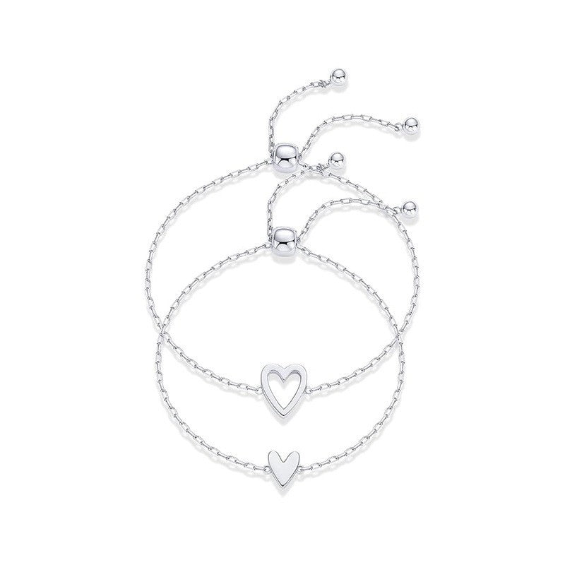 Heart Chain Bracelet pair in silver, one open heart and one small heart