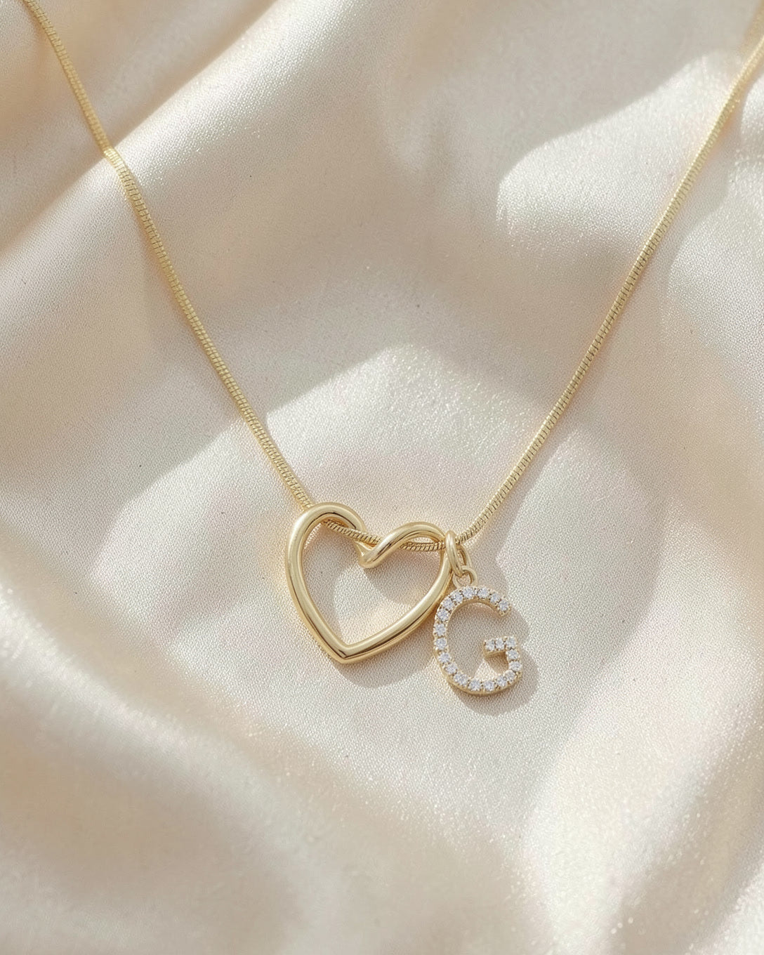 The Keepsake Heart necklace with initial G on ivory silk